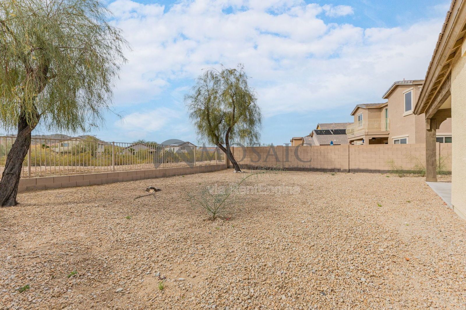 Like new home, great lot and tons of amenities in Estrella Mountain Ranch property image