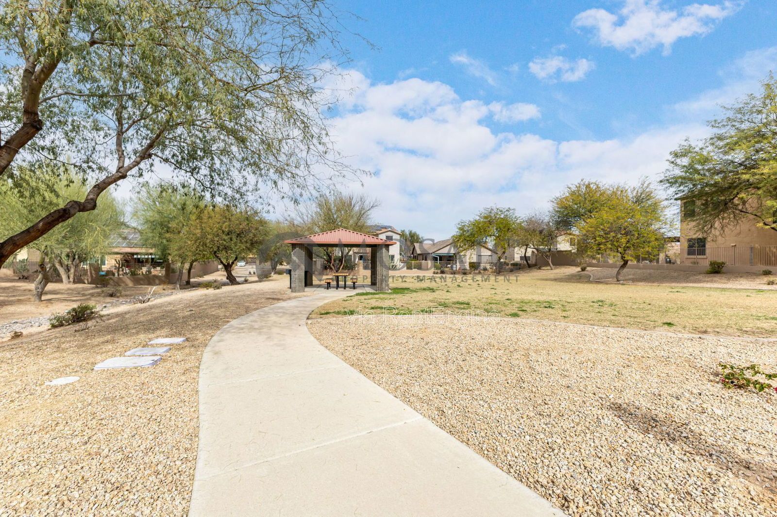 Like new home, great lot and tons of amenities in Estrella Mountain Ranch property image
