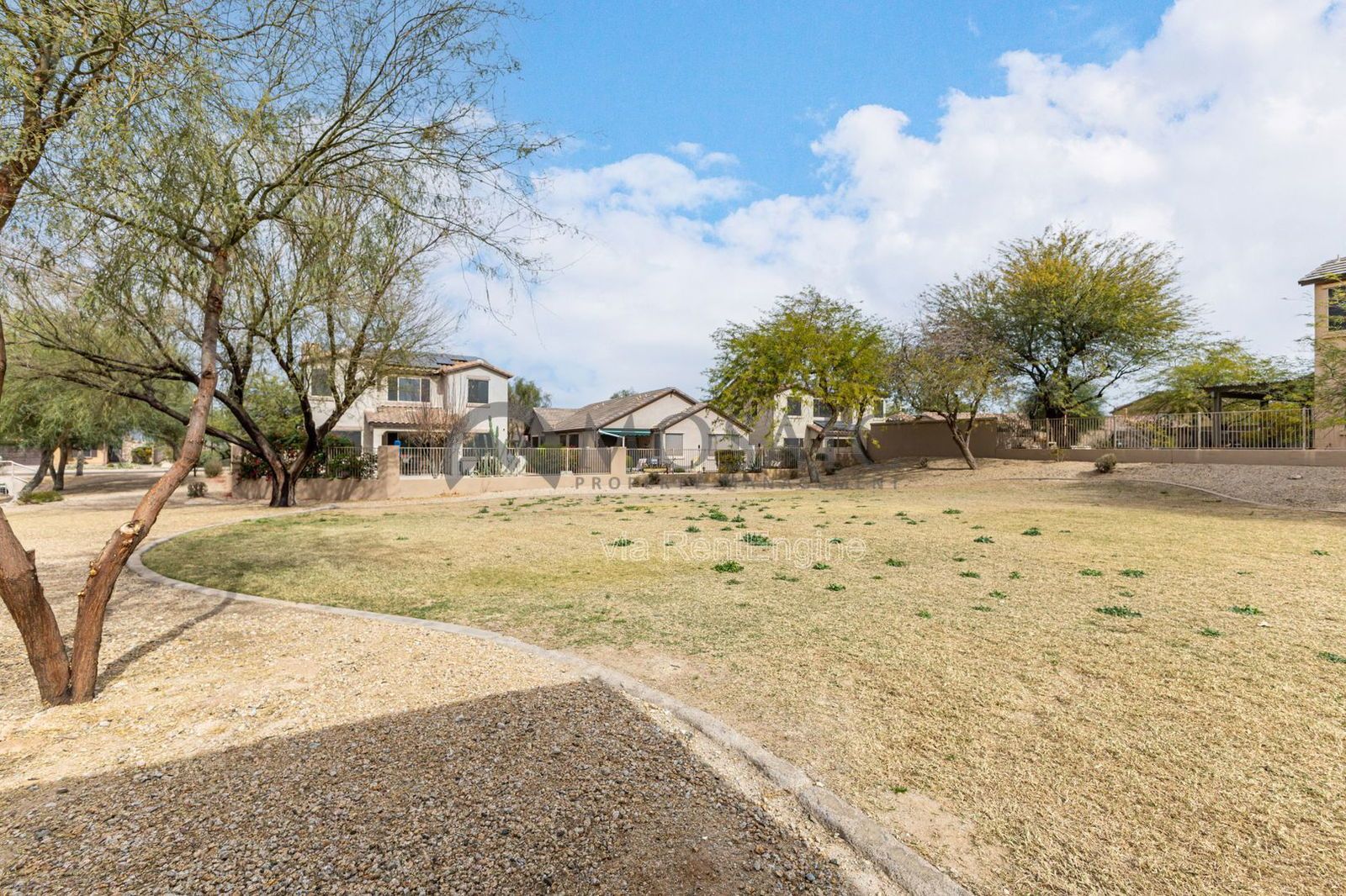 Like new home, great lot and tons of amenities in Estrella Mountain Ranch property image