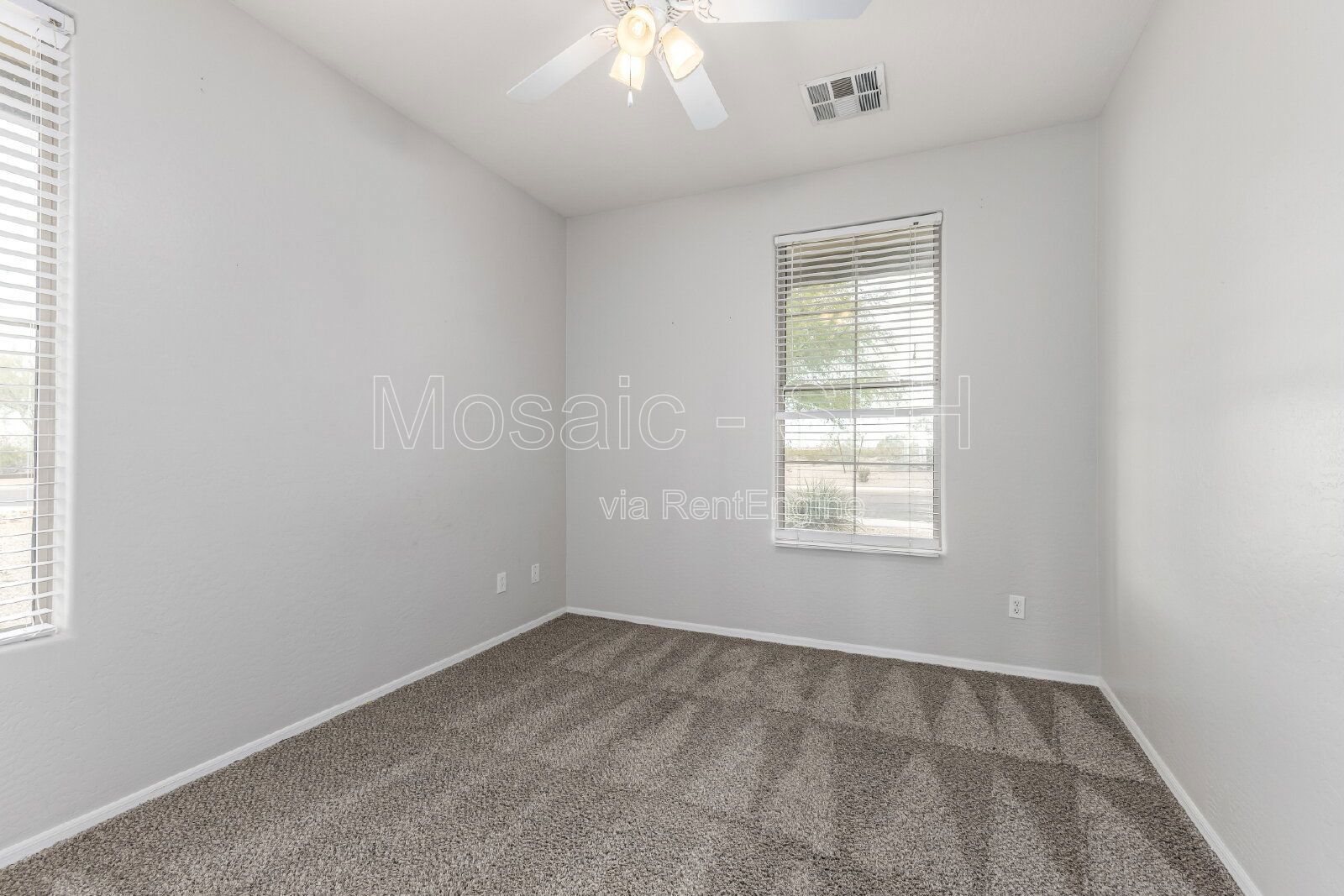 Like new home, great lot and tons of amenities in Estrella Mountain Ranch property image