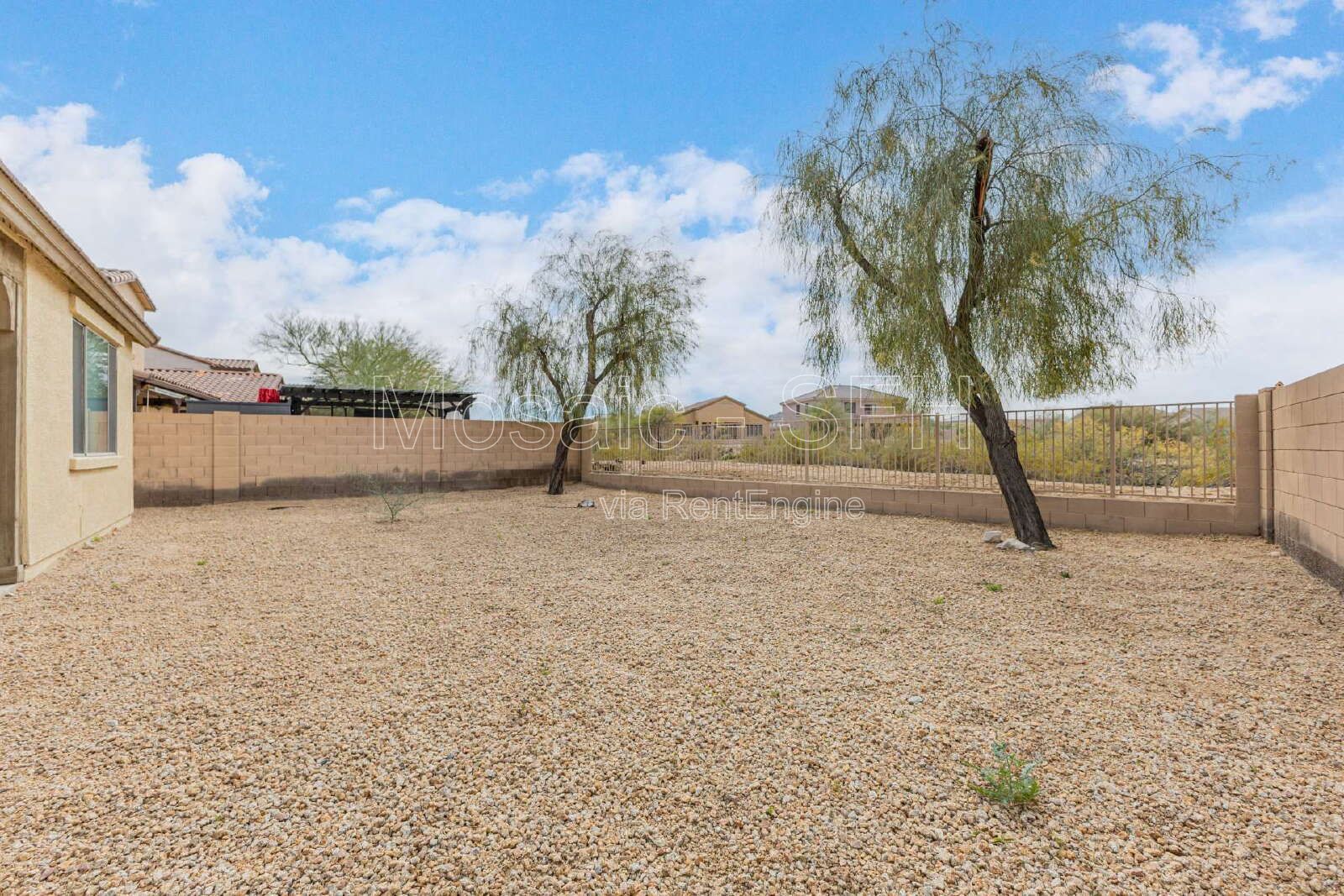 Like new home, great lot and tons of amenities in Estrella Mountain Ranch property image