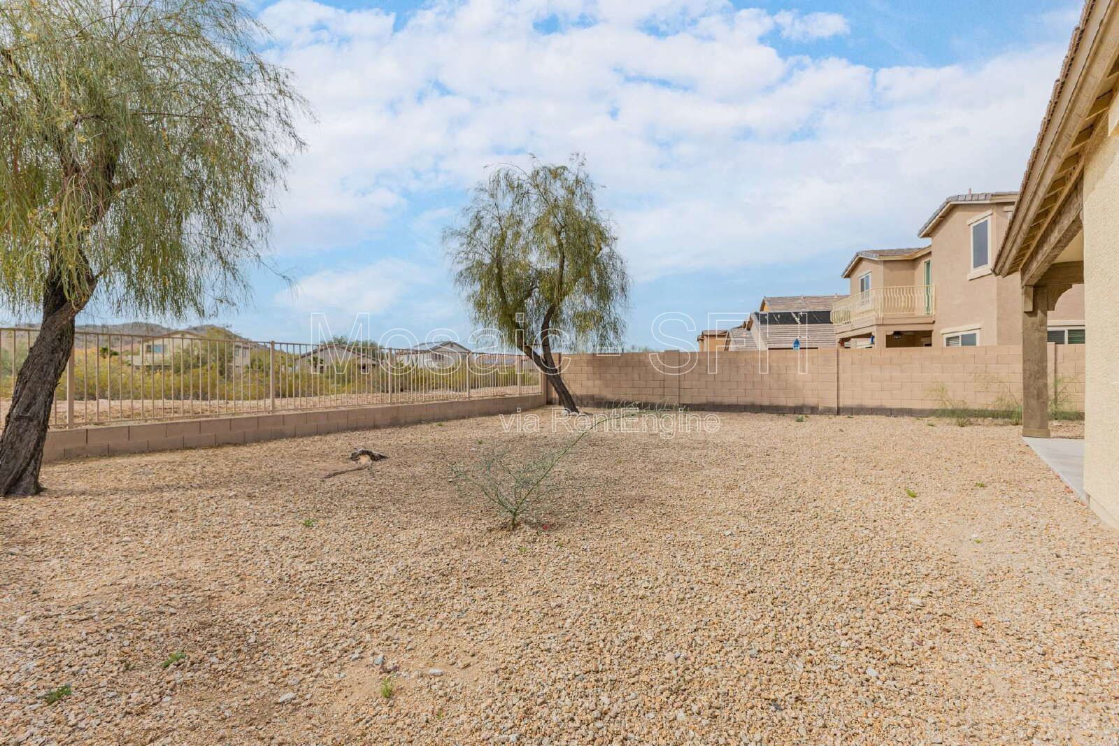 Like new home, great lot and tons of amenities in Estrella Mountain Ranch property image