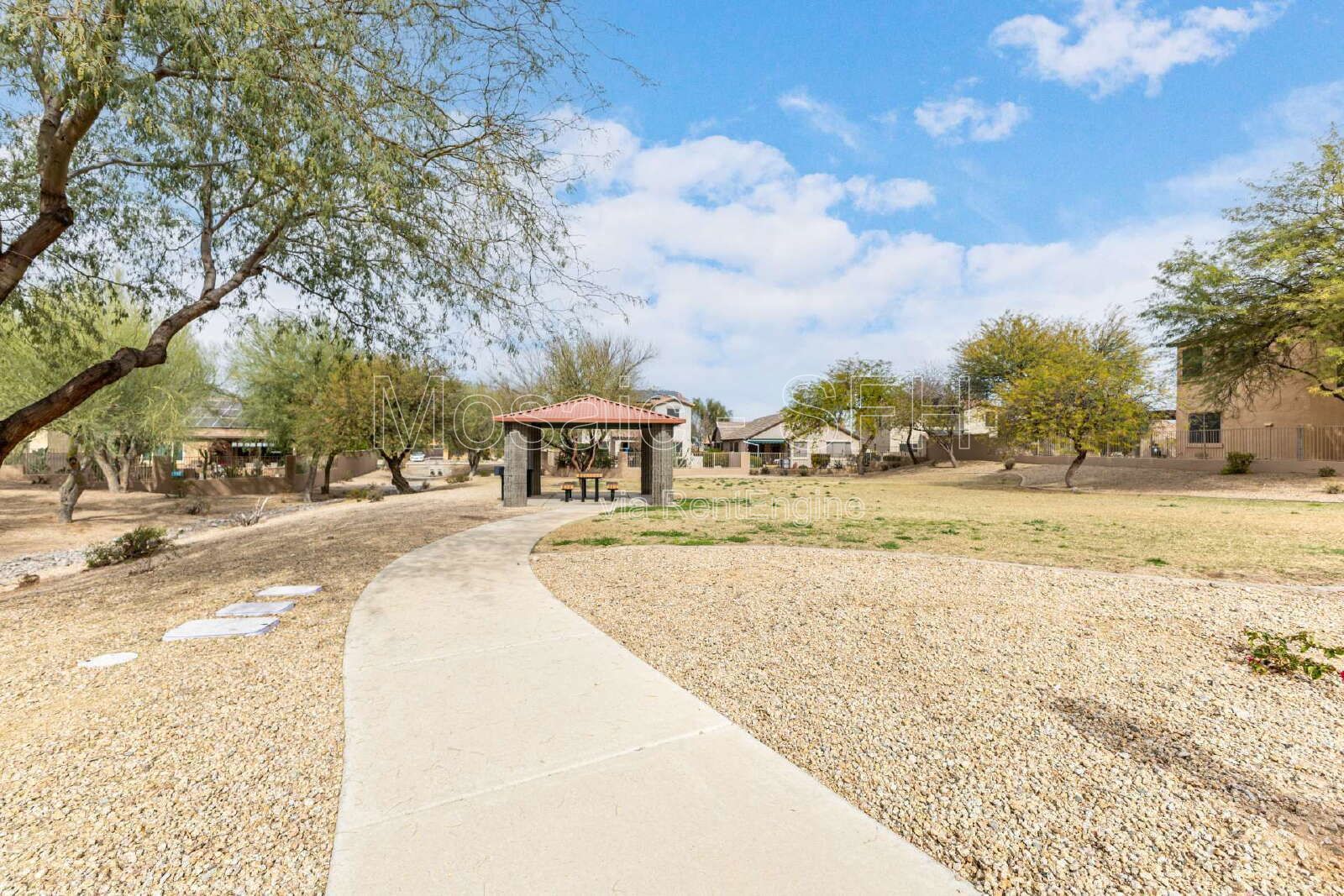 Like new home, great lot and tons of amenities in Estrella Mountain Ranch property image