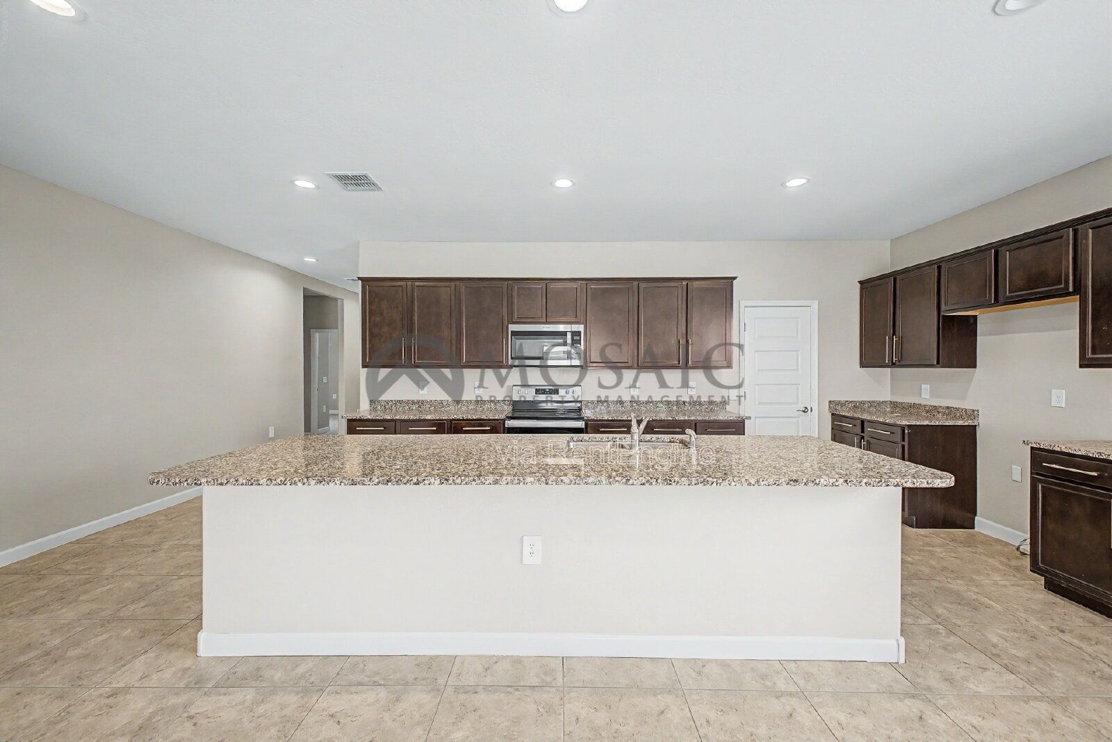 beautifully maintained three-bedroom, two-bathroom residence. Spanning an impressive 1,881 square feet. property image