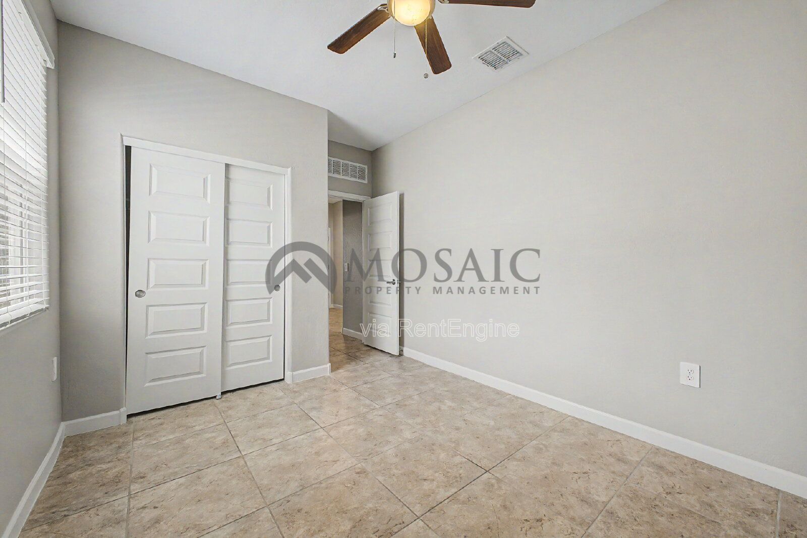 beautifully maintained three-bedroom, two-bathroom residence. Spanning an impressive 1,881 square feet. property image