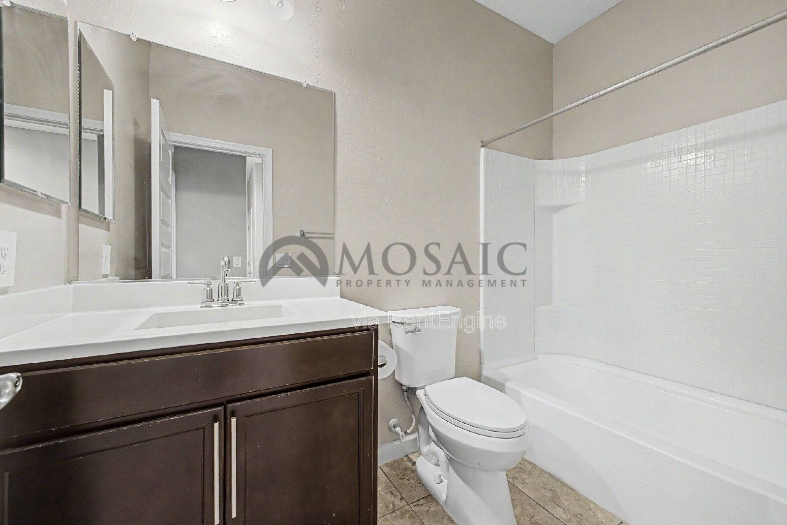 beautifully maintained three-bedroom, two-bathroom residence. Spanning an impressive 1,881 square feet. property image