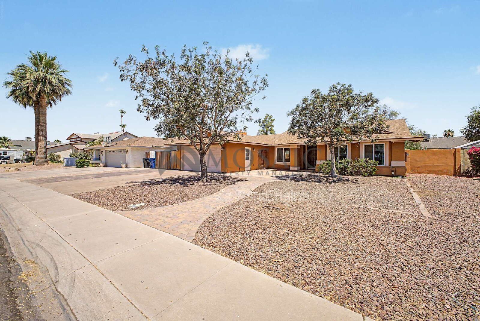 spacious four-bedroom, two-bathroom gem nestled in one of Chandler's most desirable neighborhoods! property image