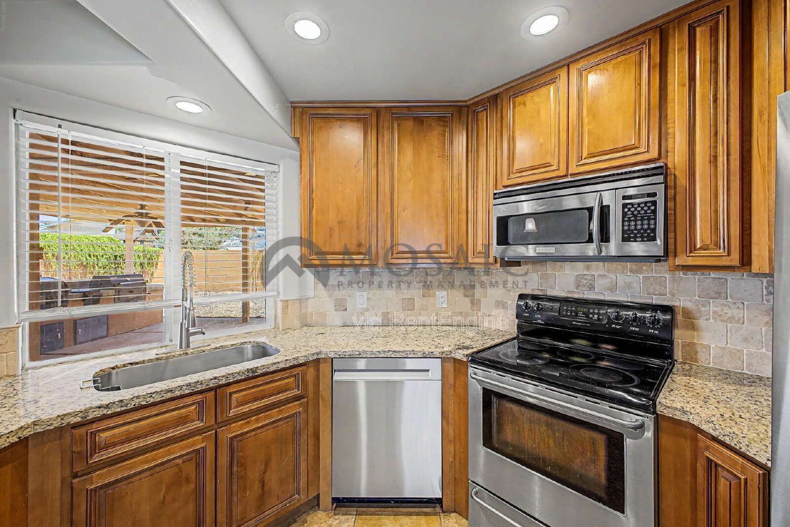 spacious four-bedroom, two-bathroom gem nestled in one of Chandler's most desirable neighborhoods! property image