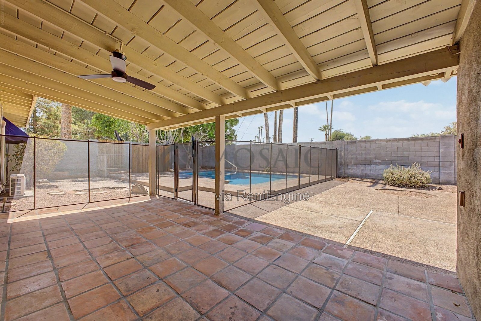 Sunshine, splashing, and a backyard built for it! property image