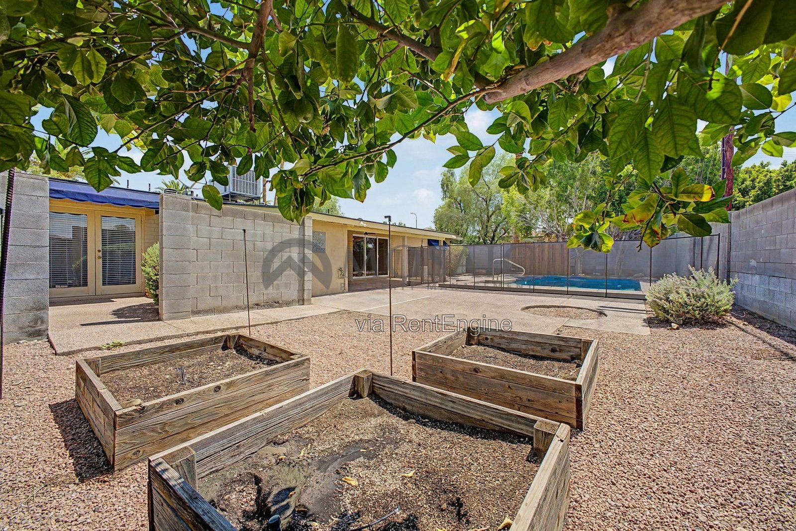 Sunshine, splashing, and a backyard built for it! property image
