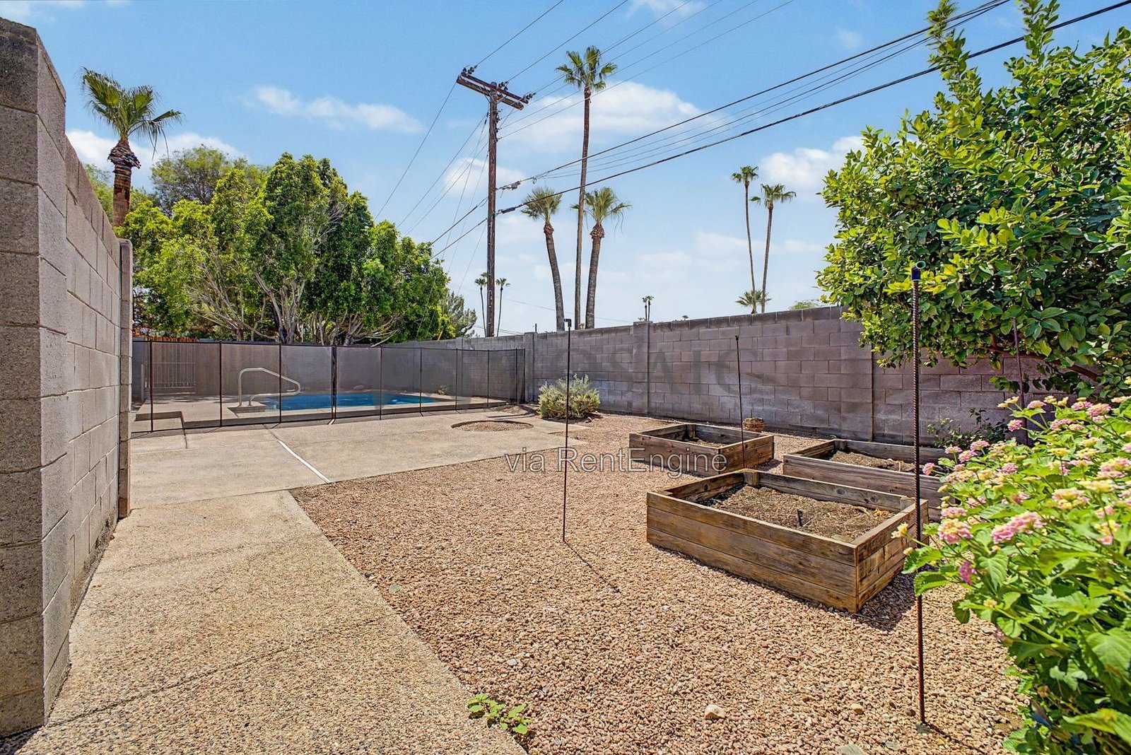 Sunshine, splashing, and a backyard built for it! property image