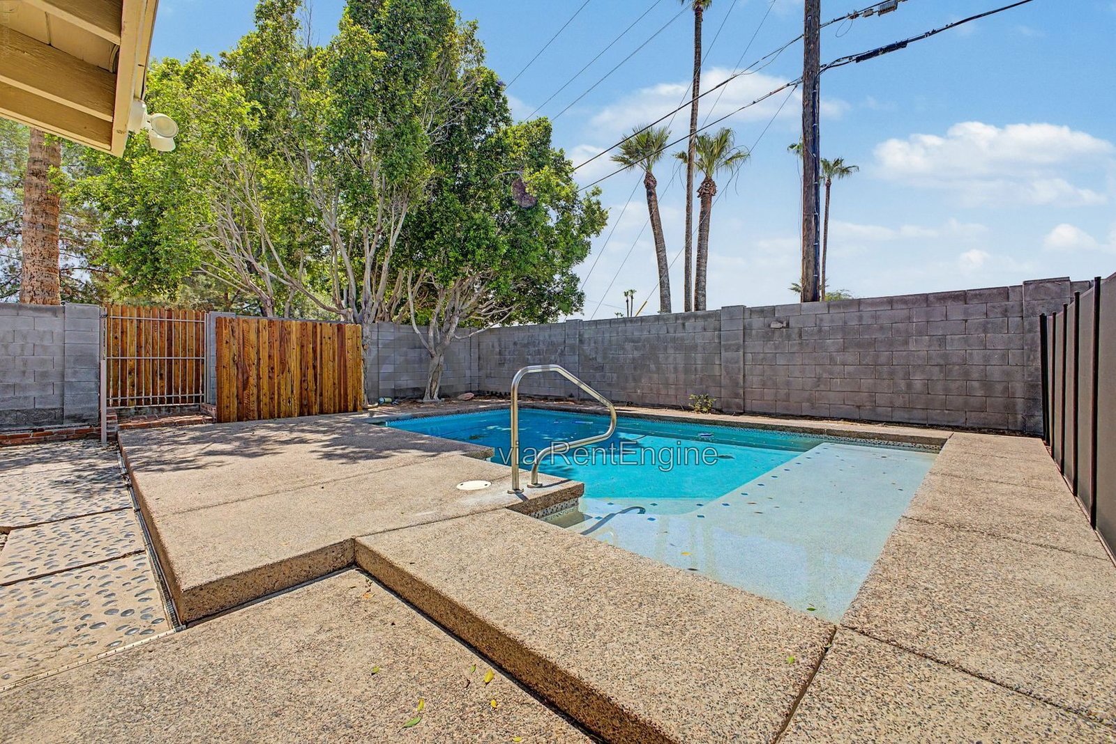 Sunshine, splashing, and a backyard built for it! property image