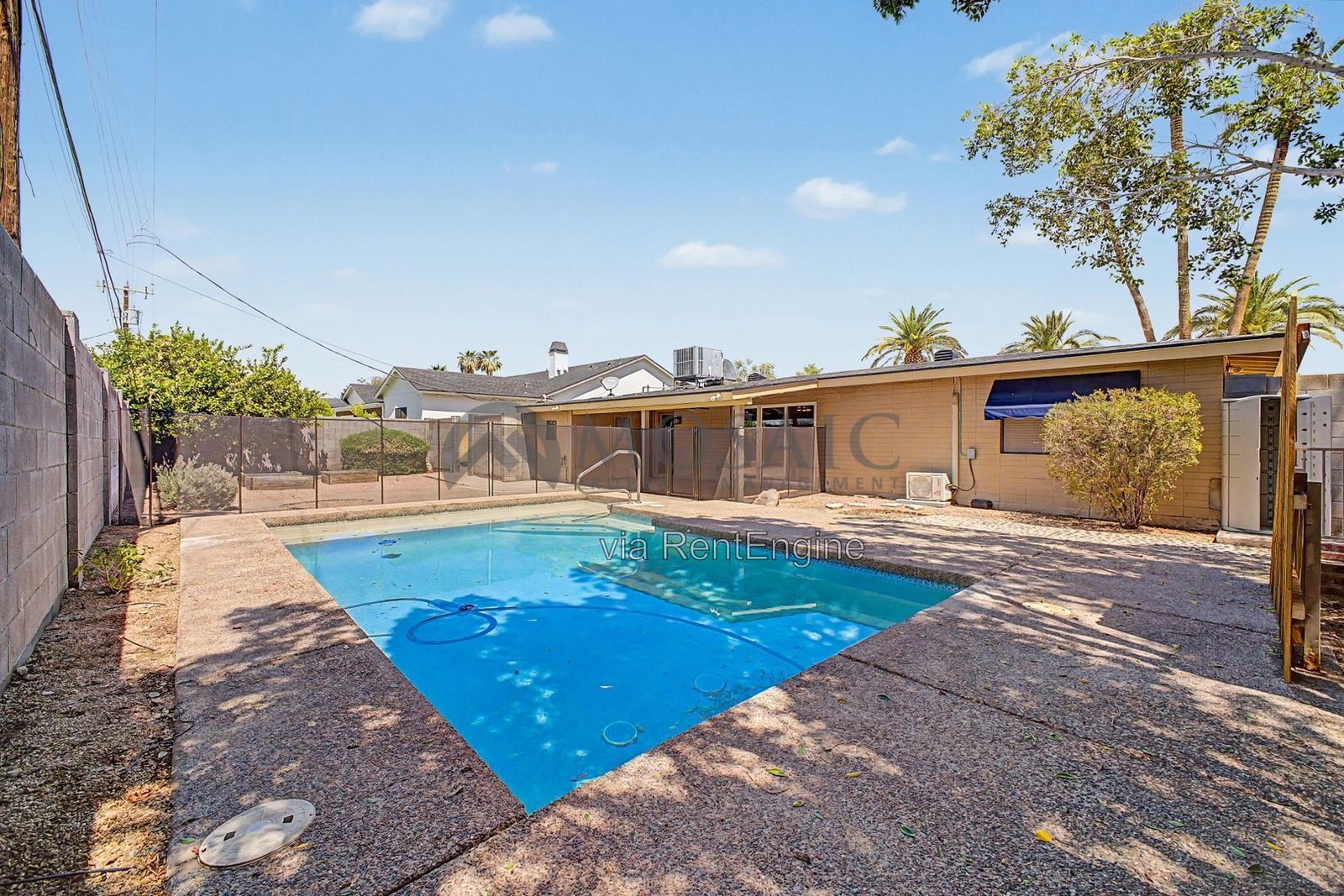 Sunshine, splashing, and a backyard built for it! property image