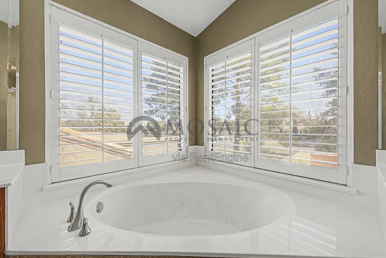 Sprawling  Val Vista Lakes 4 Bed, 3 Bath Home with Resort-Style Backyard! property image